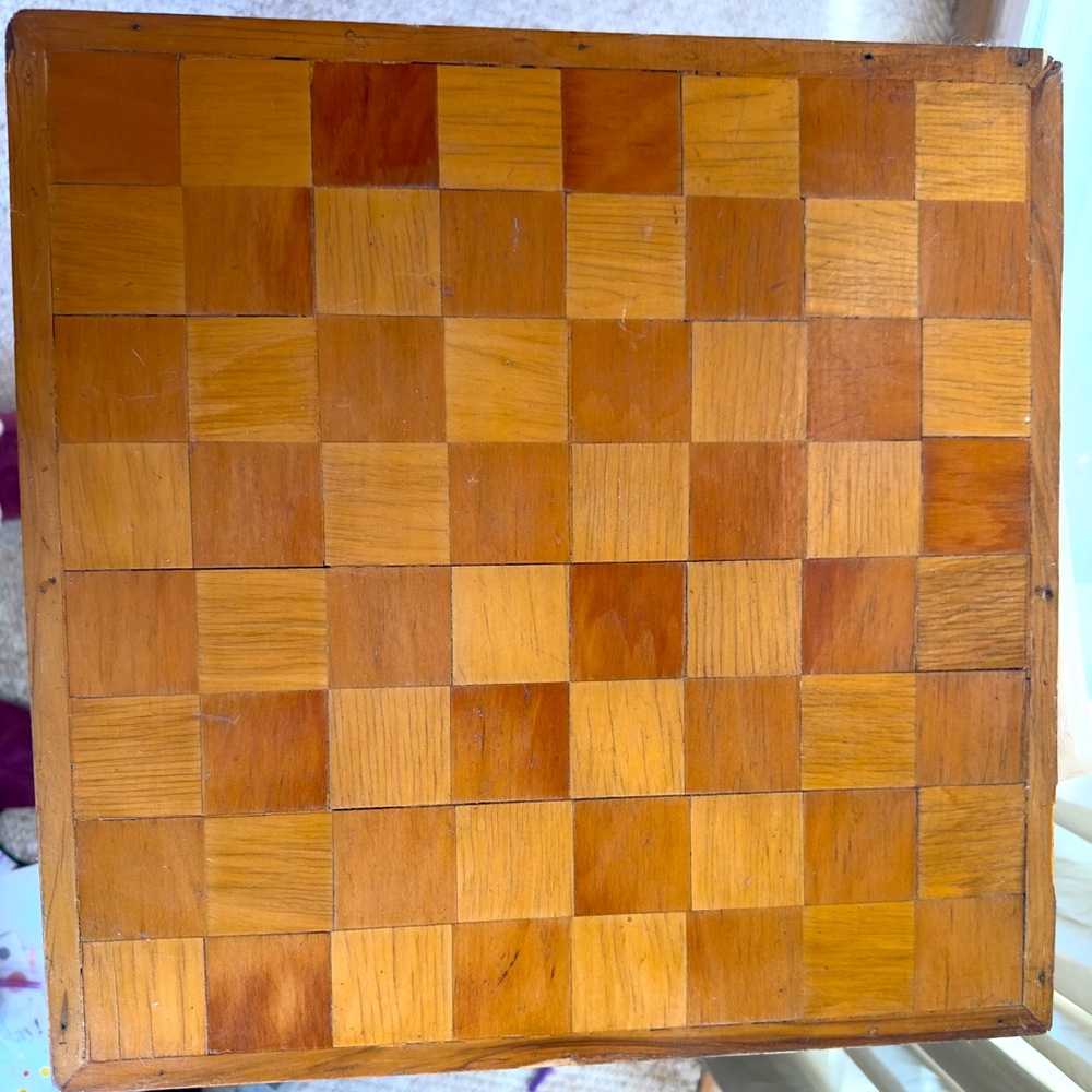 Antique folk art hand crafted, wooden checkerboard.